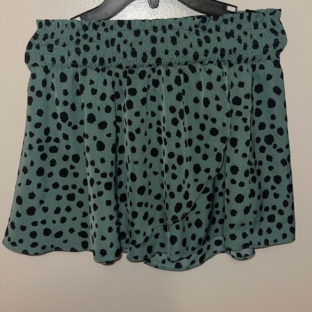 Green Dalmatian print shorts